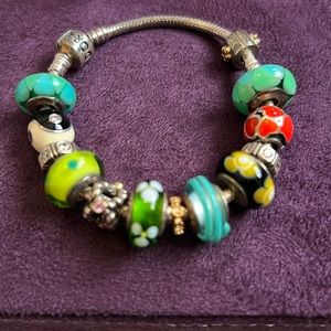 Colorful pandora bracelet. With beautiful murano beads, a heart and yin yang…